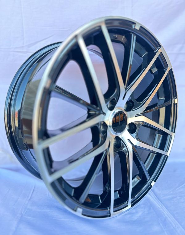 0029	R18 8J	5x114,3	ET35	64,1 	BLACK MACHINE FACE