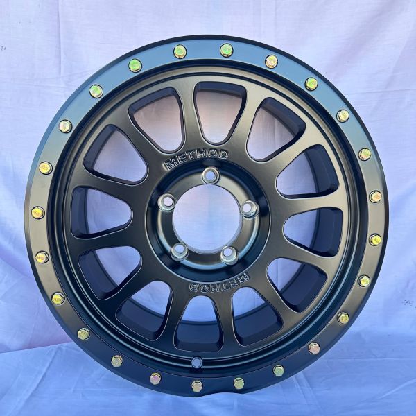 0301	R18 9J	5x139,7	ET0	112,0 	Matt Black  + Bronze Rivets