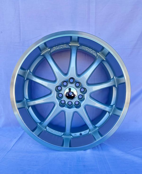 L409	R18 8J	ET27	5x100 / 5x114,3	73.1	sliver/machine lip