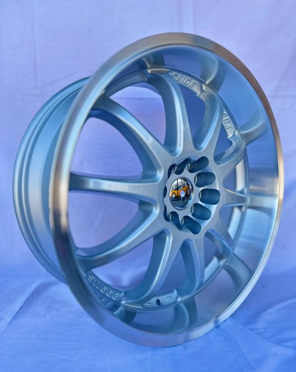 L409	R18 8J	ET27	5x100 / 5x114,3	73.1	sliver/machine lip