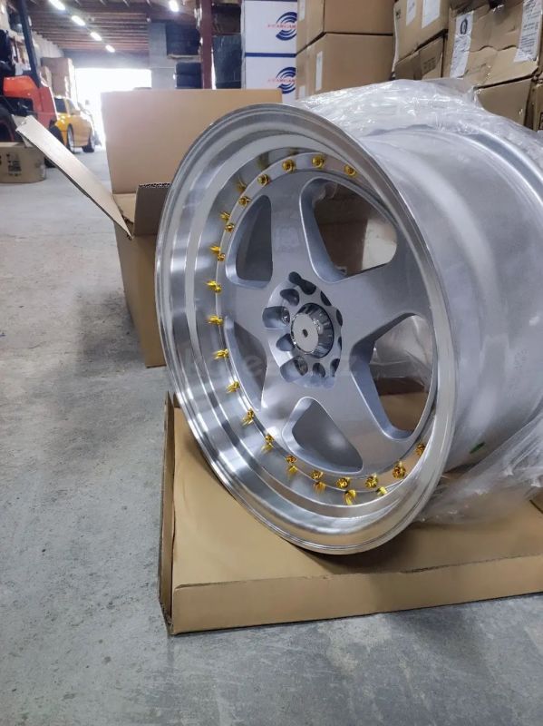 7089R R17 9J ET20	5x100 /5x114,3	73,1	Silver Polish Lip Gold Rivets