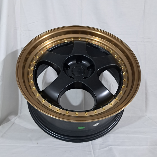 ks089 R18 8,5J 5x114,3 ET30	67,1 	SEMI MATT BLACK +BRONZE LIP +GOLD RIVET